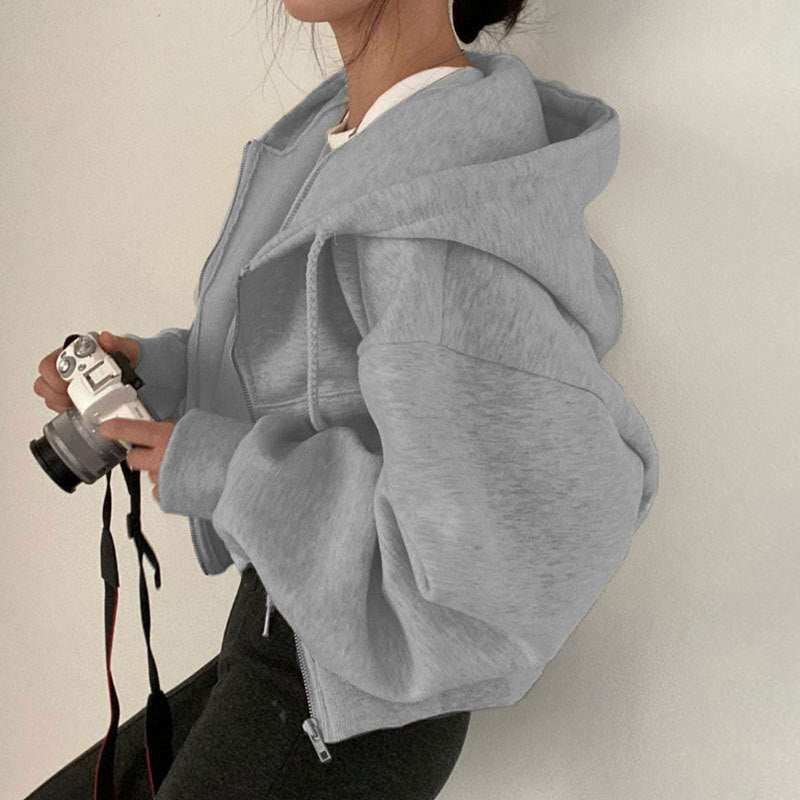 Sweat à capuche ample avec poche zippée et manches longues